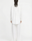 WHITE FLARED PANTS
